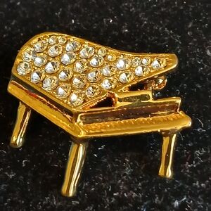 Goldtone and Crystal Piano Brooch
